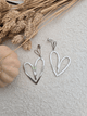 Boucles d’oreilles pendantes double cœur