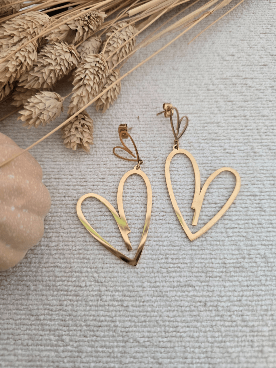 Boucles d’oreilles pendantes double cœur