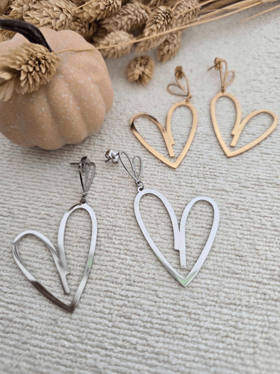 Boucles d’oreilles pendantes double cœur