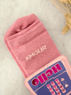 Chaussettes pailletées "AMOUR"