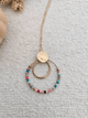 Collier pendentif rond avec perles