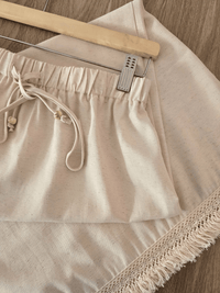 Jupe longue beige à dentelle & bord frangé