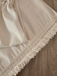 Jupe longue beige à dentelle & bord frangé