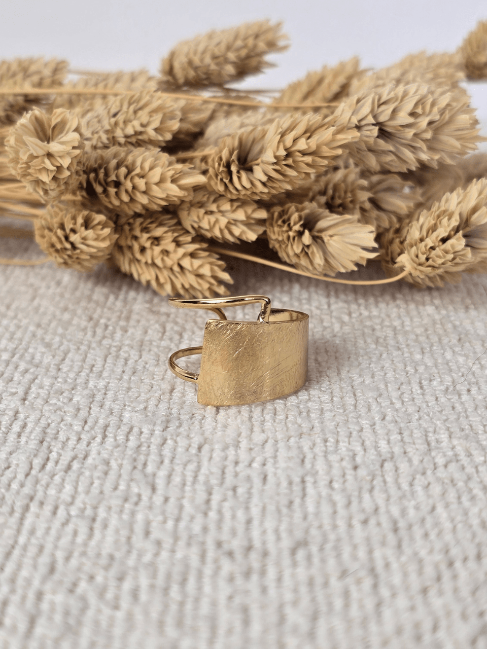 Bague dorée asymétrique réglable