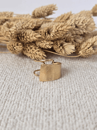 Bague dorée asymétrique réglable