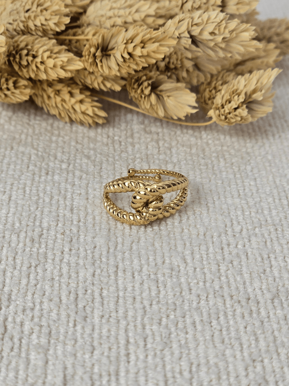 Bague dorée effet corde entrelacée réglable