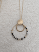 Collier pendentif rond avec perles